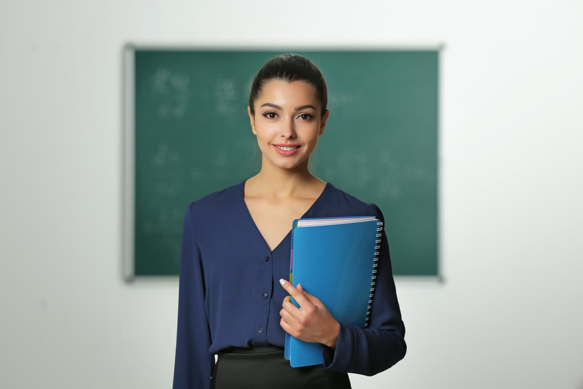 Young Teacher in Classroom